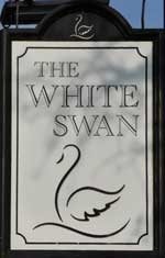The pub sign. White Swan, Eardisland, Herefordshire
