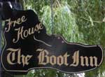 The pub sign. Boot Inn, Orleton, Herefordshire