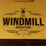 The pub sign. The Windmill, Brighton, East Sussex
