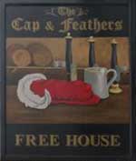 The pub sign. Cap & Feathers, Tillingham, Essex