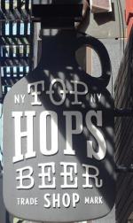 The pub sign. Top Hops, New York, America