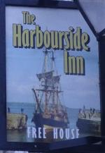 The pub sign. The Harbourside Inn, Charlestown, Cornwall