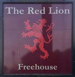 The pub sign. The Red Lion, Birchover, Derbyshire