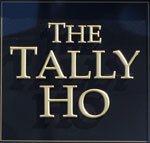 The pub sign. The Tally Ho, North Finchley, Greater London