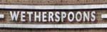 The pub sign. Wetherspoons (also known as Station), Leeds, West Yorkshire
