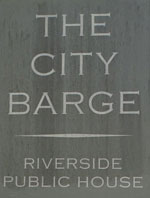 The pub sign. The City Barge, Chiswick, Greater London