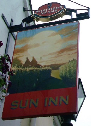 The pub sign. Sun Inn, Faversham, Kent
