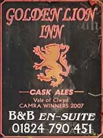 The pub sign. Golden Lion Inn, Llangynhafal, Denbighshire
