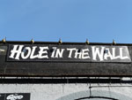 The pub sign. The Hole in the Wall, Waterloo, Central London