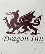 The pub sign. Dragon Inn, Crickhowell, Powys