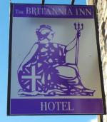 The pub sign. Britannia Inn Hotel, Sherborne, Dorset