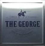 The pub sign. The George, Sherborne, Dorset