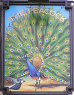 The pub sign. The Peacock, Bakewell, Derbyshire
