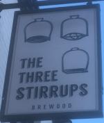 The pub sign. The Three Stirrups, Brewood, Staffordshire