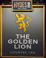 The pub sign. The Golden Lion, Rossett, Clwyd