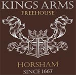 The pub sign. Kings Arms, Horsham, West Sussex