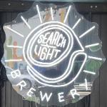 The pub sign. Searchlight Brewery, Queenstown, New Zealand