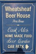 The pub sign. Wheatsheaf Beer House, Tattingstone, Suffolk