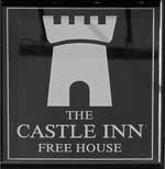 The pub sign. The Castle Inn, Axminster, Devon