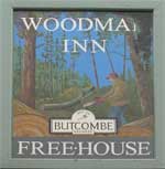 The pub sign. Woodman Inn, Bridport, Dorset