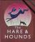 Pub sign for The Hare & Hounds, Claygate